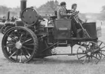 People Riding on a Steam Engine