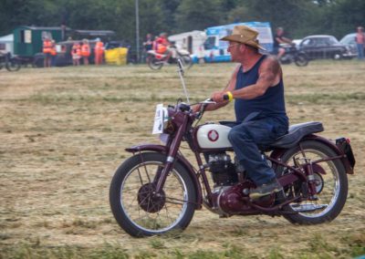 Man in a Hat on a Motorbike
